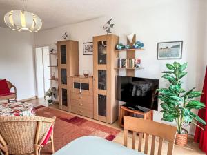 TV a/nebo společenská místnost v ubytování Apartment Karsten by Interhome