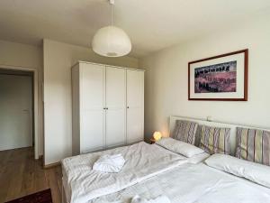 Postel nebo postele na pokoji v ubytování Apartment Karsten by Interhome