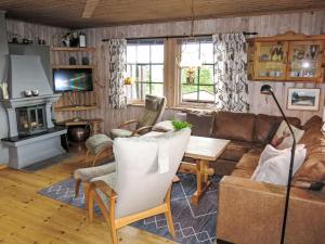 TV a/nebo společenská místnost v ubytování Holiday Home Skafjellstoga by Interhome
