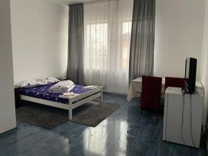 Katil atau katil-katil dalam bilik di Studio Rentals