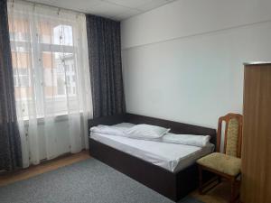 Katil atau katil-katil dalam bilik di Studio Rentals