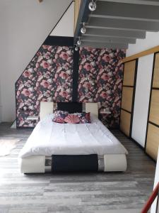 Postel nebo postele na pokoji v ubytování Villa Le Phoenix