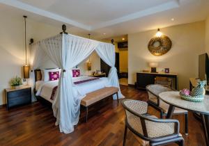 Bali Sunshine Nusa Dua客房内的一张或多张床位