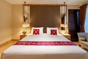 Bali Sunshine Nusa Dua客房内的一张或多张床位