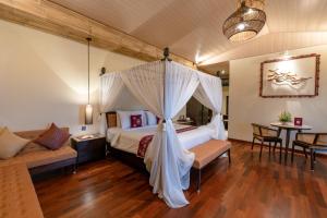 Bali Sunshine Nusa Dua客房内的一张或多张床位