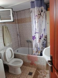Koupelna v ubytování Αξέχαστη διαμονή - Unforgettable accommodation