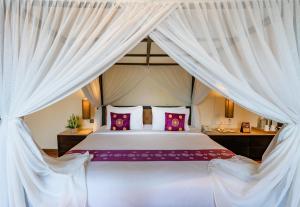 Bali Sunshine Nusa Dua客房内的一张或多张床位