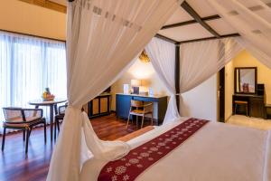 Bali Sunshine Nusa Dua客房内的一张或多张床位