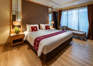 Bali Sunshine Nusa Dua客房内的一张或多张床位