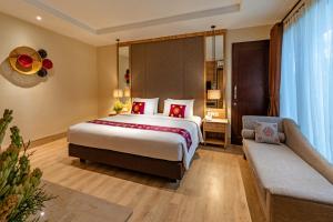 Bali Sunshine Nusa Dua客房内的一张或多张床位