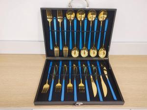 a black box filled with different types of forks and knives at 辉煌夜市 4房泳池花园别墅 订4日提供免费接机 in Ban Na Song