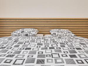 Posteľ alebo postele v izbe v ubytovaní Apartment Chic Mountain Terrace Lounge by Interhome