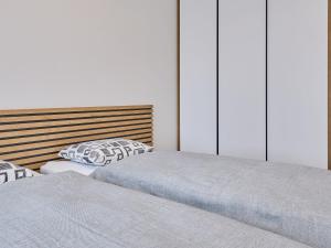 Posteľ alebo postele v izbe v ubytovaní Apartment Chic Mountain Terrace Lounge by Interhome