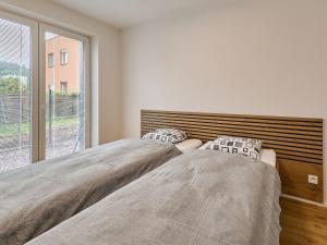 Posteľ alebo postele v izbe v ubytovaní Apartment Chic Mountain Terrace Lounge by Interhome