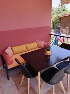 Posezení v ubytování Αξέχαστη διαμονή - Unforgettable accommodation