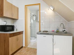 Kuchnia lub aneks kuchenny w obiekcie Apartment Kemping by Interhome