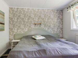Säng eller sängar i ett rum på Holiday Home Munkhalla Utsikten - B