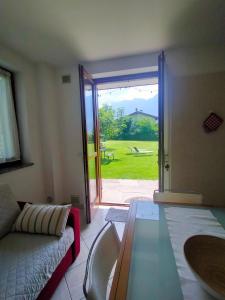 Posteľ alebo postele v izbe v ubytovaní Appartamento Lago