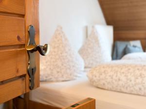 a close up of a doorhandle to a bedroom at Holiday Home Bruni by Interhome in Manderscheid