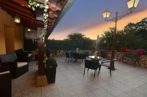 A balcony or terrace at Villa Tia Toni - 1002