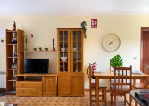 A television and/or entertainment centre at Villa Tia Toni - 1002