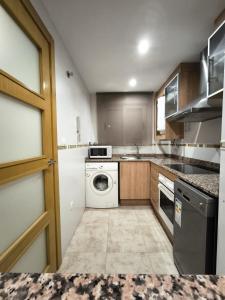 Kuchyň nebo kuchyňský kout v ubytování Apartamento en Oropesa