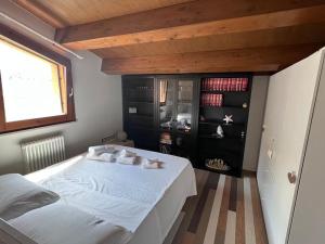 Ένα ή περισσότερα κρεβάτια σε δωμάτιο στο Giada Family House