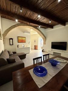 TV a/nebo společenská místnost v ubytování Appartamento I Borghi Antichi