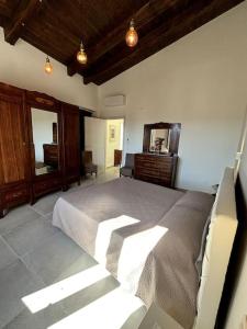 Postel nebo postele na pokoji v ubytování Appartamento I Borghi Antichi