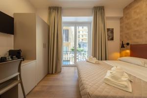 Giường trong phòng chung tại Relais Sole