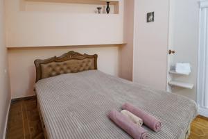 Ένα ή περισσότερα κρεβάτια σε δωμάτιο στο Apartments on Paronyan 15