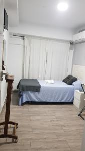 Postel nebo postele na pokoji v ubytování Guesthouse Central