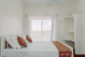 Letto o letti in una camera di Avana Resort Watamu