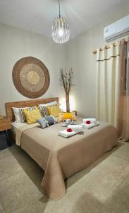 Postel nebo postele na pokoji v ubytování Aeraki Luxury Apartment