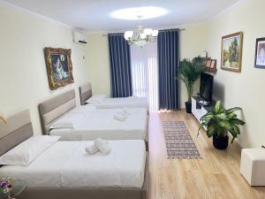 Postel nebo postele na pokoji v ubytování Kasmi Home 2
