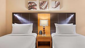 Letto o letti in una camera di Hilton Dresden an der Frauenkirche