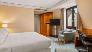 Letto o letti in una camera di Hilton Dresden an der Frauenkirche