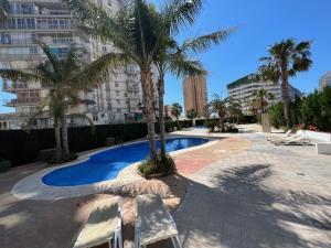 Bazén v ubytování Apartamento Esmeralda Suites nebo v jeho okolí
