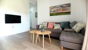 a living room with a couch and a table at San Fausto in Aguadulce