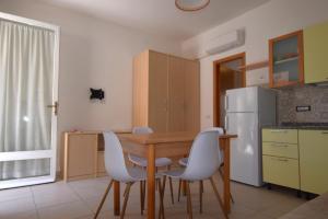 A kitchen or kitchenette at La Marina 2 Még 13 kép