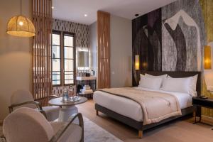 Ліжко або ліжка в номері Palais Ségurane Boutique Hôtel