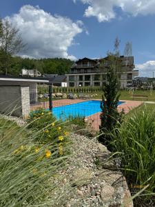 Bazén v ubytovaní Apartament Krzysztofa Bochusa alebo v jeho blízkosti