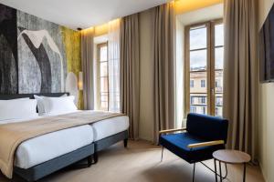 Ліжко або ліжка в номері Palais Ségurane Boutique Hôtel