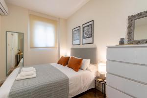 Ein Bett oder Betten in einem Zimmer der Unterkunft Apartamento Boutique a estrenar