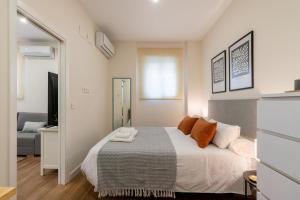 Ein Bett oder Betten in einem Zimmer der Unterkunft Apartamento Boutique a estrenar