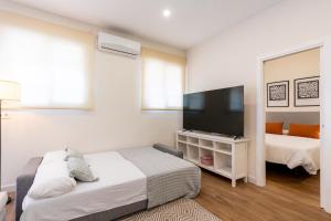 Ein Bett oder Betten in einem Zimmer der Unterkunft Apartamento Boutique a estrenar