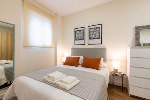 Ein Bett oder Betten in einem Zimmer der Unterkunft Apartamento Boutique a estrenar