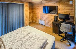 Gulta vai gultas numurā naktsmītnē 3 Bedroom Amazing Home In Lillehammer