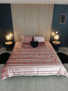 Ένα ή περισσότερα κρεβάτια σε δωμάτιο στο escapade romantique 2