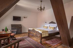 Voodi või voodid majutusasutuse Hotel Ruze toas